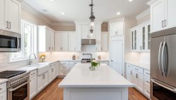 Modern kitchen remodel in Clear Lake Texas with custom cabinets and island