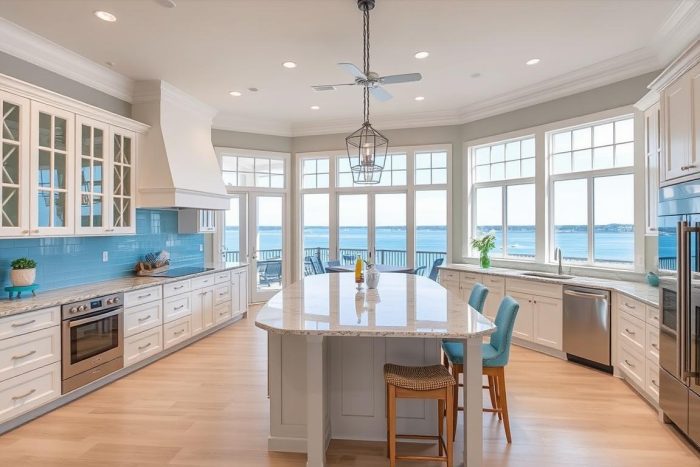 Open concept kitchen layout with island in a Clear Lake Shores home